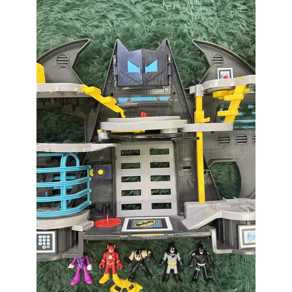 Fisher-Price Imaginext DC Super Friends Transforming Batcave Playset with 5